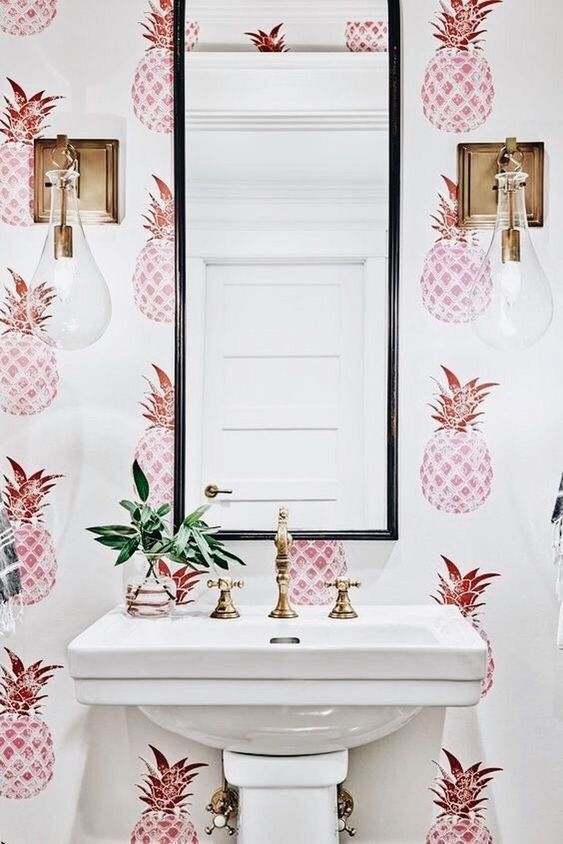 fun pink pineapple wallpaper will give your bathroom a tropical feel, highlight it with greenery and brass