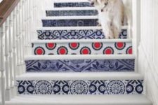 07 give your stairs a bold look decorating them with bright printed wallpaper – different for each riser