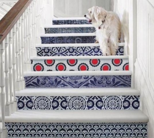 give your stairs a bold look decorating them with bright printed wallpaper – different for each riser