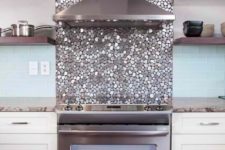 07 pebble-shaped metallic tiles for an oven backsplash and for a shiny touch in the neutral space