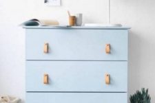 09 powder blue Tarva dresser with leather handles can be used for storage in any room
