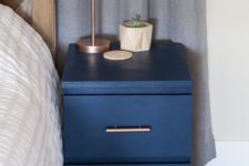 10 an IKEA Malm nightstand hacked with navy paint and chic brass handles looks very cool and bold