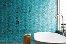 10 gorgeous turquoise fishscale tiles make a statement in this bathroom