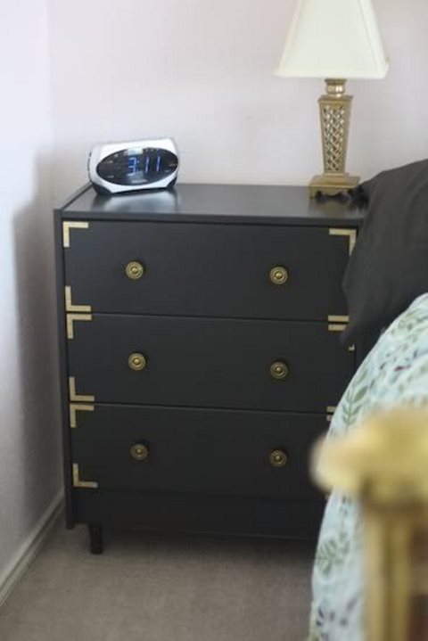 a glam IKEA Rast hack with gilded touches is used a stylish nightstand with plenty of storage