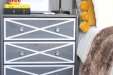14 a modern nightstand of an IKEA Rast dresser in grey and white, with crystal knobs is a chic idea