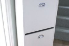 18 an IKEA Bissa hack with silver knobs and marble contact paper on top looks elegant and stylish