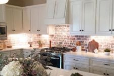 19 creamy traditional cabinets look cool with a red brick backsplash that brings color and texture in
