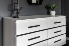 21 an IKEA Malm dresser made floating and with black stripes and handles attached to make it look dramatic