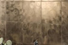 21 modern metallic tiles with a circular pattern will change your bathroom and give it a bold look