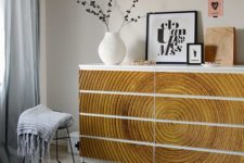 24 IKEA Malm dresser hack with gorgeous wood-imitating stickers that add texture and structure to the space