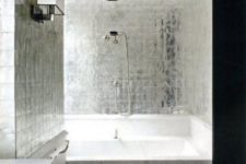 25 silver square tiles will add a touch of glam to your shower and stand out in the contrasting space