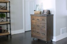 26 IKEA Rast hacked into an apothecary cabinet with dark stain, casters and a metal countertop for a retro feel