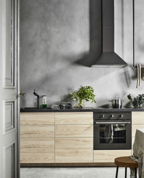 an IKEA Askersund kitchen with a whole concrete wall, not only a backsplash looks spectacular