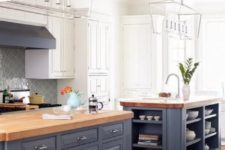 vintage-inspired grey cabinets are softened with light-colored butcher block countertops