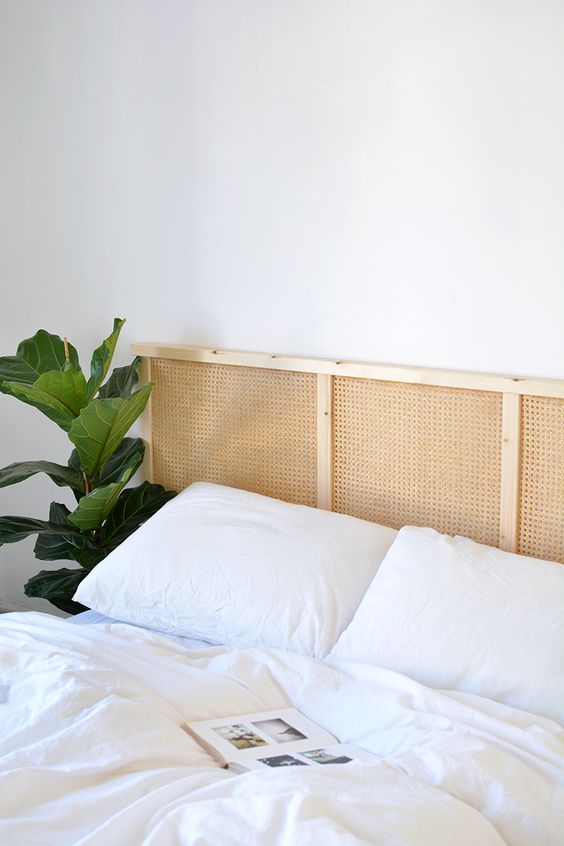 a cane headboard is a very trendy idea, which brings an outdoor feel inside   it's right what we all want now