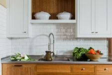 03 a cozy rustic space with rich-colored wooden cabinets and white ones plus a subway tile backsplash