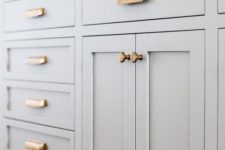 05 dove grey cabinets with copper handles and knobs are a stylish combo for a chic space
