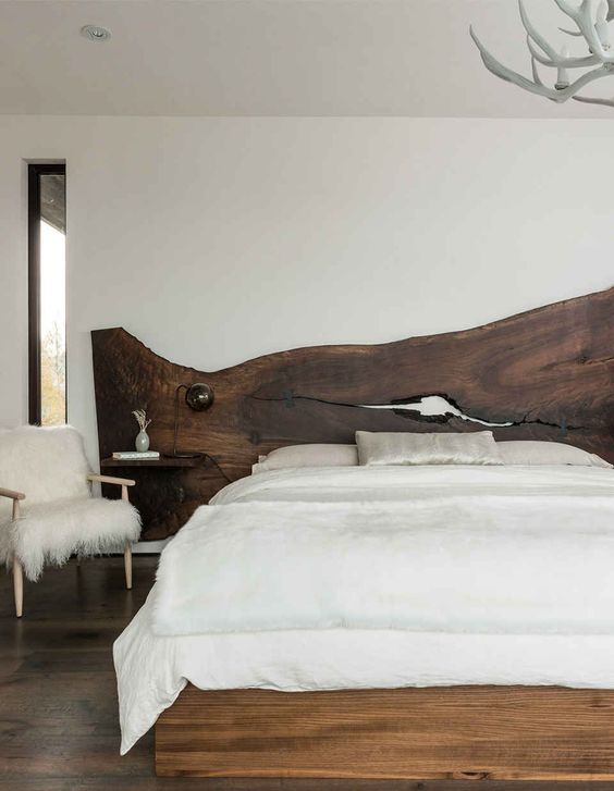 a living edge wood headboard makes a bold statement in any bedroom, it also bring a touch of rich color