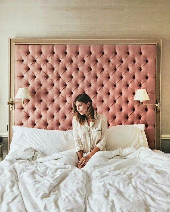 an oversized pink framed headboard will become an elegant statement decoration - choose any color you like