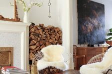 14 stack firewood in the space between the fireplace and the wall and you’ll eaisly and stylishly fill the awkward space
