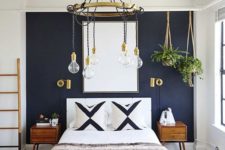 15 a navy statement wall plus gilded touches make this bedroom very elegant and such decor is timeless
