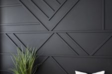 17 a black paneled accent wall is a great statement in your living room or bedroom, it will texture