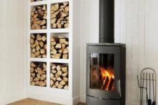 17 a large open storage unit next to your wood burning stove is a perfect idea, and you can DIY this piece easily