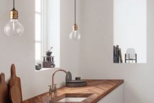 18 chevron clad wooden kitchen countertop makes the minimalist white kitchen bolder