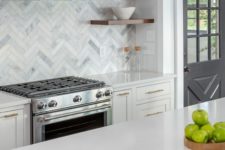 22 a farmhouse kitchen in graphite grey and white, with gold touches, wooden shelves and a catchy marble tile backsplash