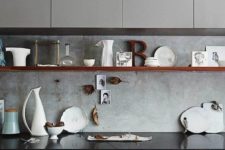 25 light grey cabinets and a concrete backsplash create a very cohesive and chic look