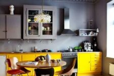 a lovely grey-yellow kitchen design