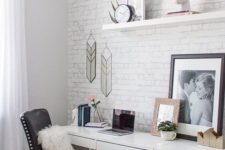 a whitewashed brick wall makes this neutral modern space more stylish and chic, you can make it real or faux