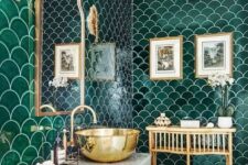 an emerald fish scale tile bathroom, with white appliances and gold touches here and there is very elegant