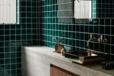 glossy dark green tiles, stone, marble tiles and wood create a fantastic combo for a stylish bathroom look
