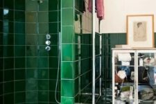 glossy emerald tiles to highlight the shower zone add a colorful touch and make the look bolder