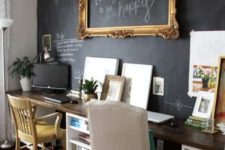 05 a vintage home office with a chalkboard wall that can be used for chalking, making notes and features art in a frame