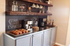 14 a home coffee bar with a chalkboard backsplash that allows leaving messages and noting what you are serving