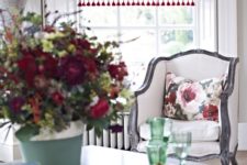 15 floral Roman shades and a small pillow for a refreshing summer feel in your dining room
