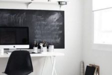 17 a Nordic home office mostly in white, with a chalkboard statement that can be used as a memo board