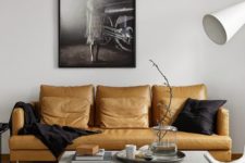 18 a stylish monochromatic living room in contemporary style, with a yellow leather sofa as a colorful statement