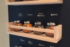 19 a chalkboard wall with spice racks is a perfect idea – you can mark each jar without any labels