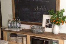 21 a large chalkboard used to leave notes, chalk down recipes and other interestign information in the kitchen
