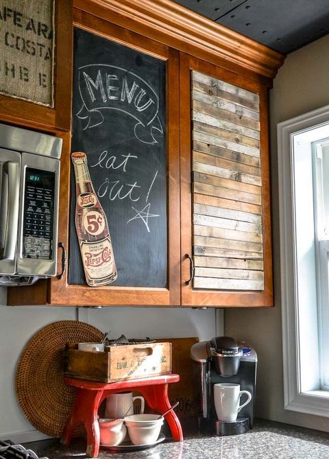 a vintage cabinet with a chalkboard door to mark recipes and other stuff you may need