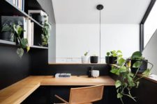 26 a small minimalist home office with a monochromatic color scheme, a wooden desk and a leather chair plus greenery