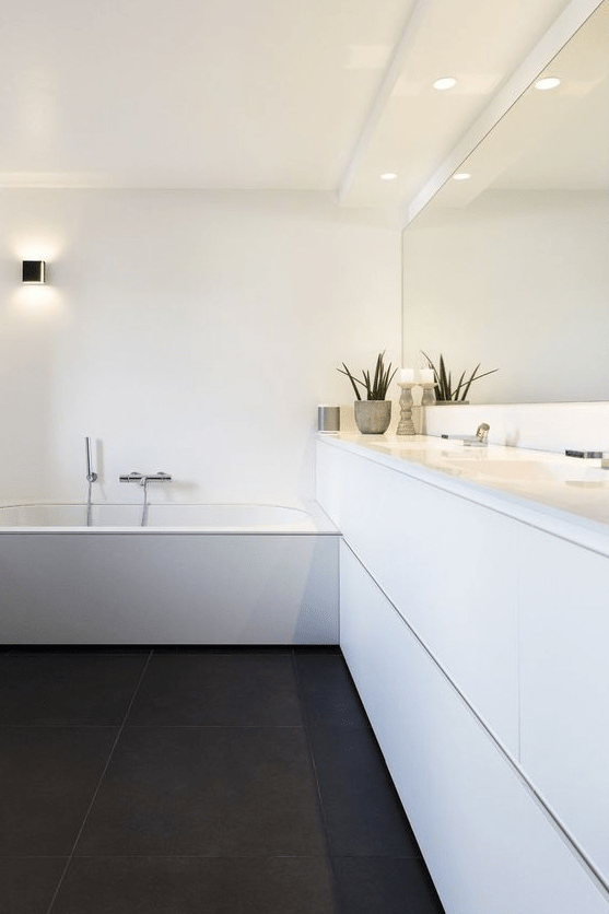 a lovely black and white bathroom design