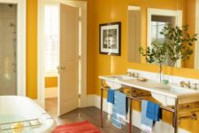 08 a vintage-inspired mustard bathroom with white for a fresh look, vintage appliances and fixtures