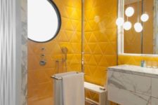 10 a bright contemporary bathroom with yellow triangle tile shower space, white marble and pendant lamps