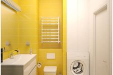 16 a minimalist sunny yellow and white bathroom with a color block effect and a floating vanity plus a built-in washing machine