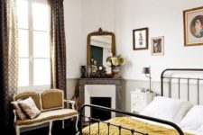 25 a refined vintage Paris bedroom with a mustard loveseat and a mustard blanket to infuse the space with color