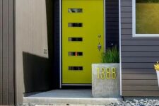 a mid-century modern neon green front door with glass pants and a concrete planter with a neon green house number for a modern home